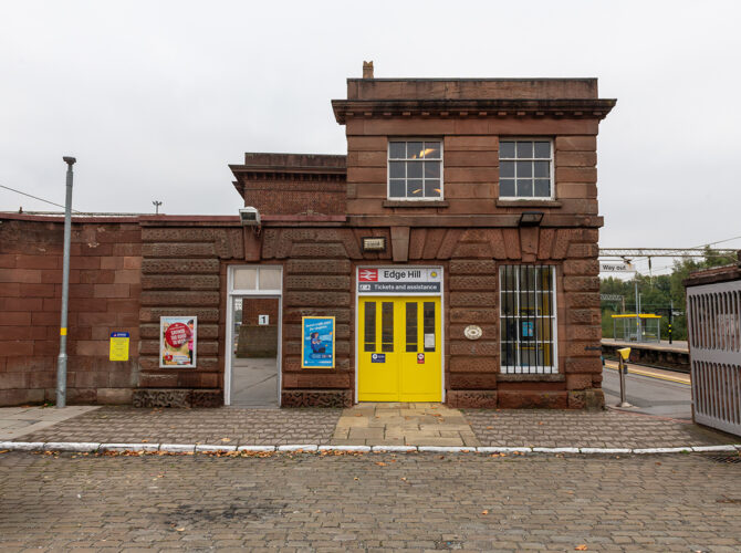 Main entrance to Edge Hill Station, showing the ticket office set within robust early railway architecture.