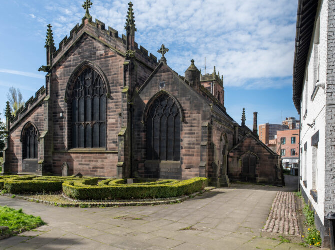 St Mary’s Church Eccles with Gothic windows and surrounding paths