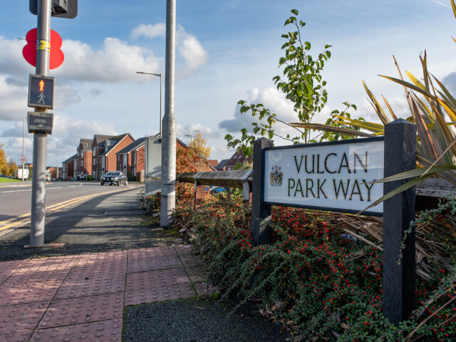 A street sign marking Vulcan Park Way, a modern reminder of the locomotive works that once stood nearby.