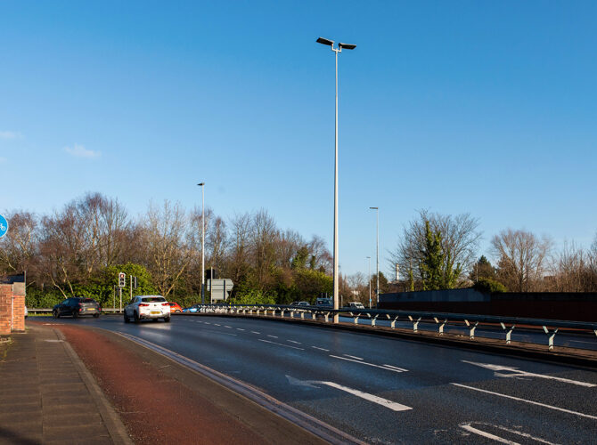 Busy roadway marking the transformed landscape where the dam once stood.