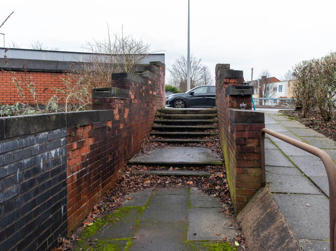 View of pedestrian access route beside the modern road.
